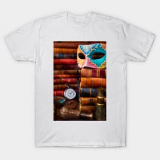 Old Mask On Stack Of Antique Books T-Shirt